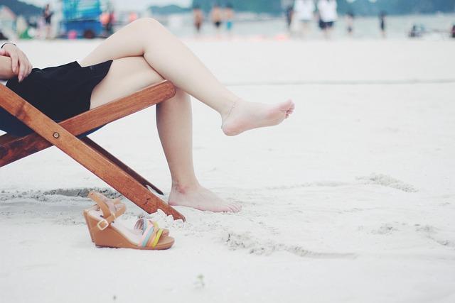 woman, beach, beach chair, feet, female, barefoot, girl, nature, lady, legs, leisure, outdoors, recreation, relaxation, resort, resting, sand, sandals, sitting, wooden chair, sandy beach, shore, seashore